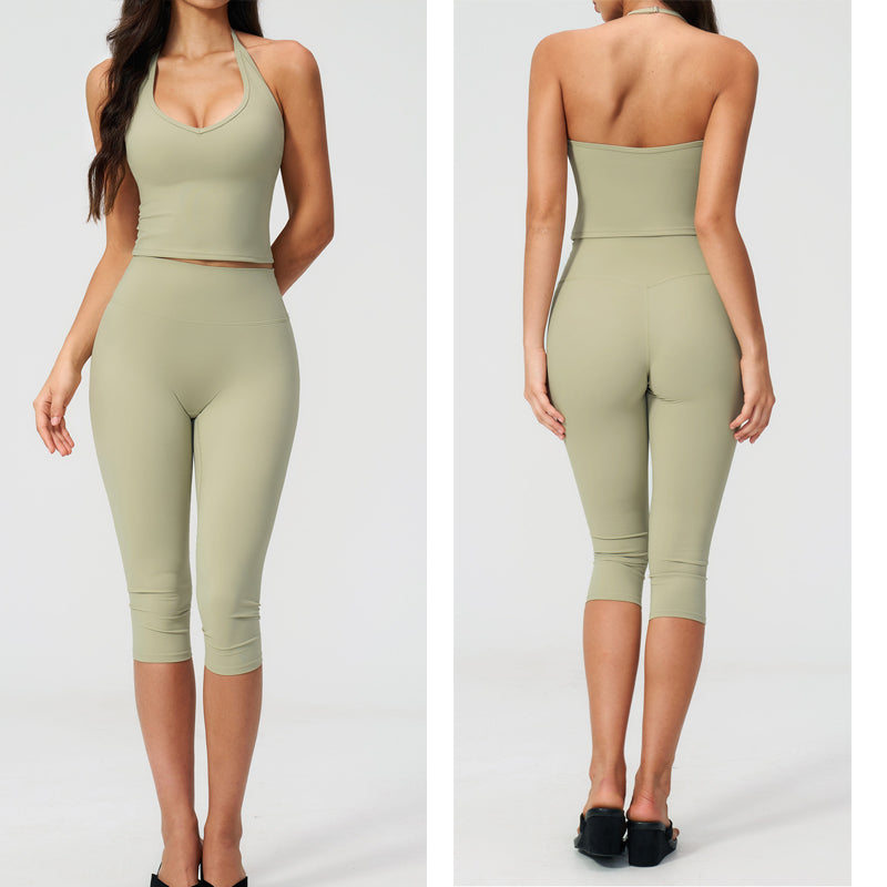 Women’s sports vest suit in moss green: crop top and capri leggings, front and back view.