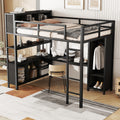 Black metal loft bed with wardrobe storage, desk space, and ladder with side cabinets