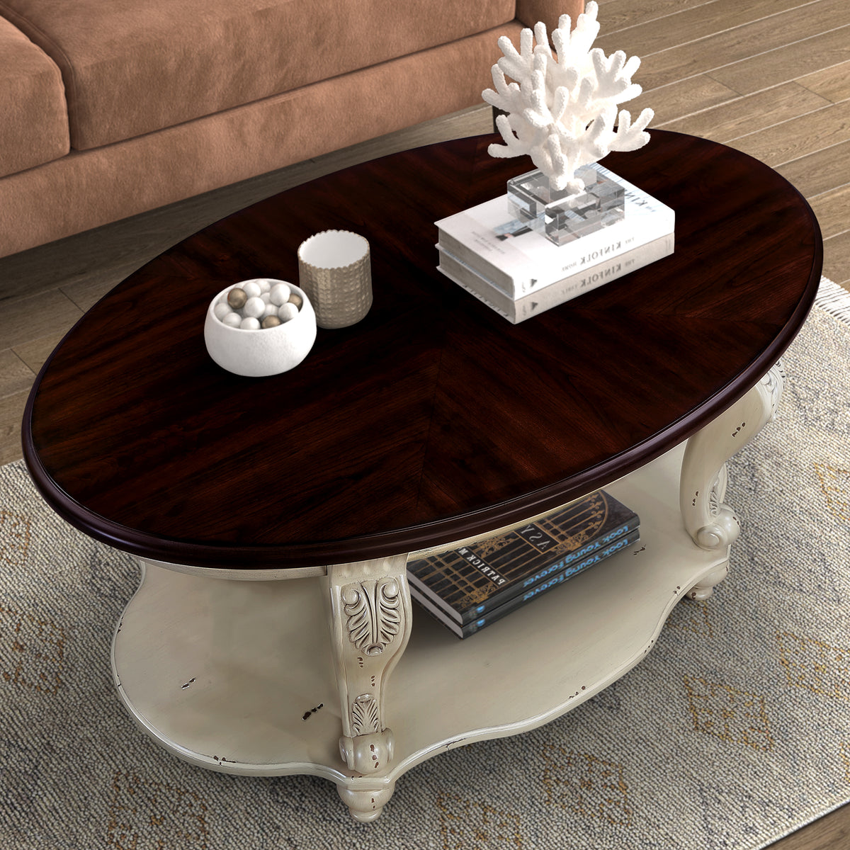 Oval coffee table top view with dark cherry tabletop and open lower rack