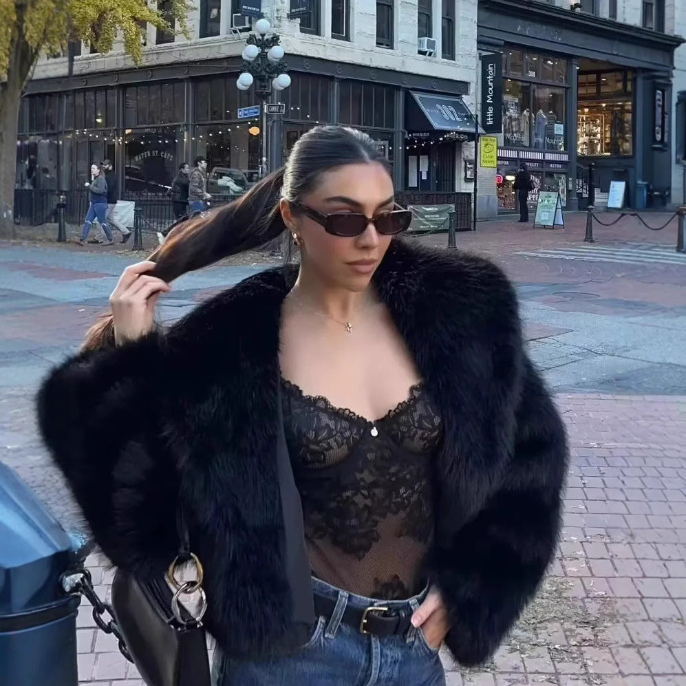 Black faux fur jacket with wide collar, long sleeves, open front