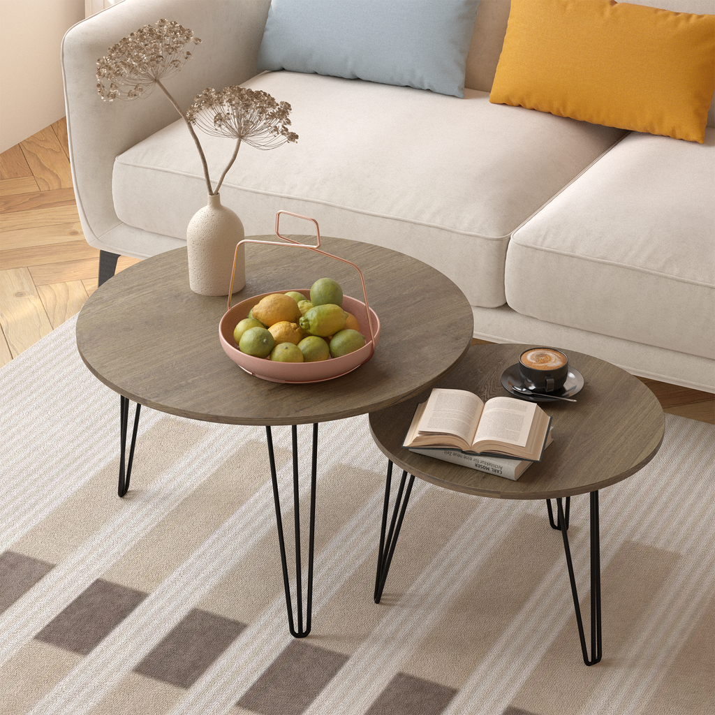 Round nesting coffee table set of 2 with dark wood-look tops and black tripod-style metal legs