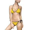 Women's triangle bikini set with yellow sunburst print and black tie sides