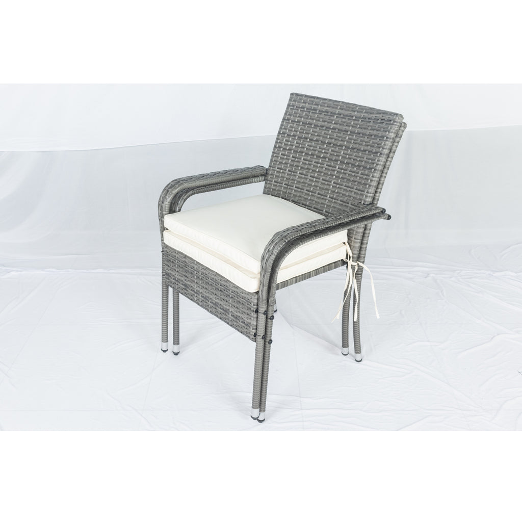 Gray wicker armchair with white seat cushion