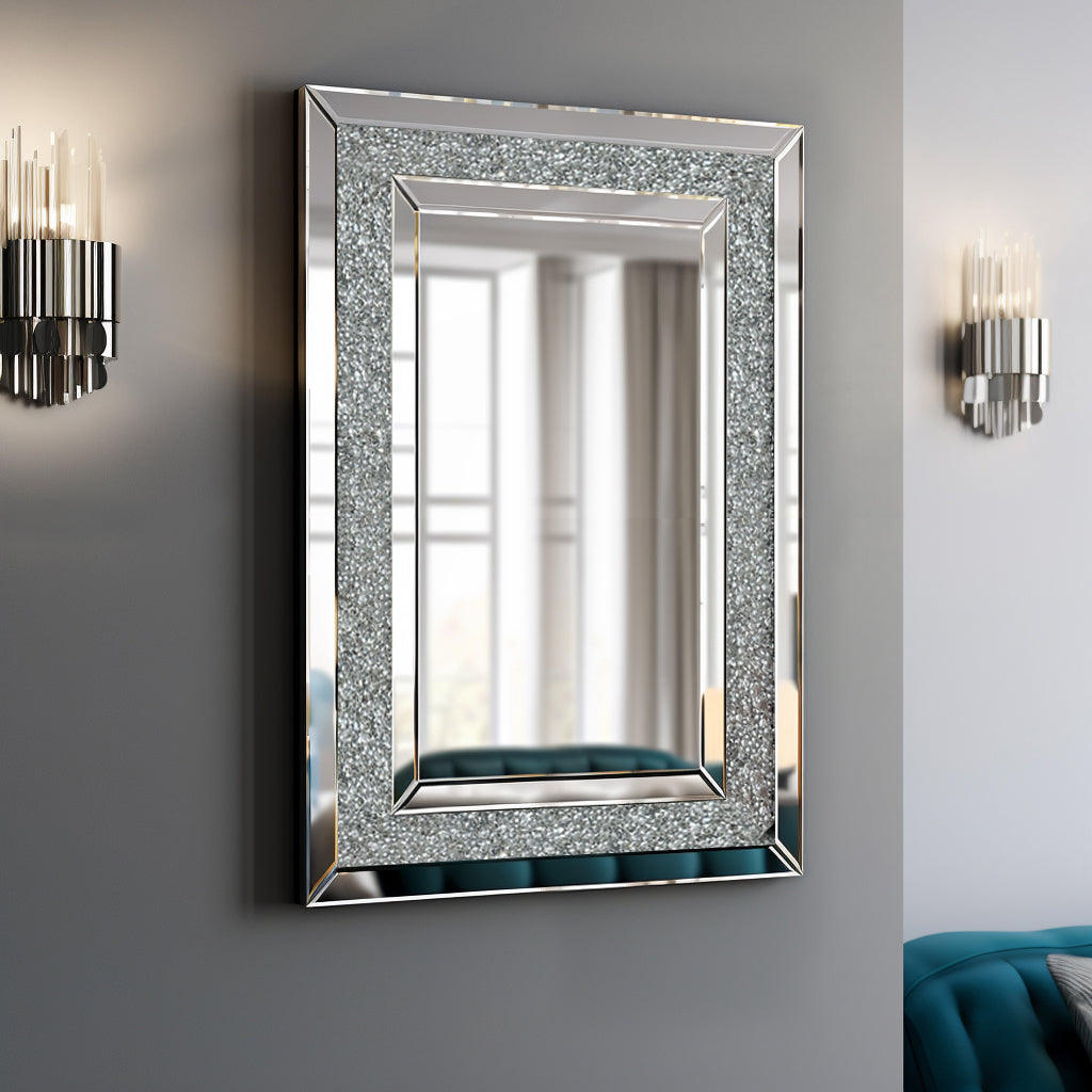 Rectangular wall mirror with silver glitter-speckled frame and clear reflective glass.