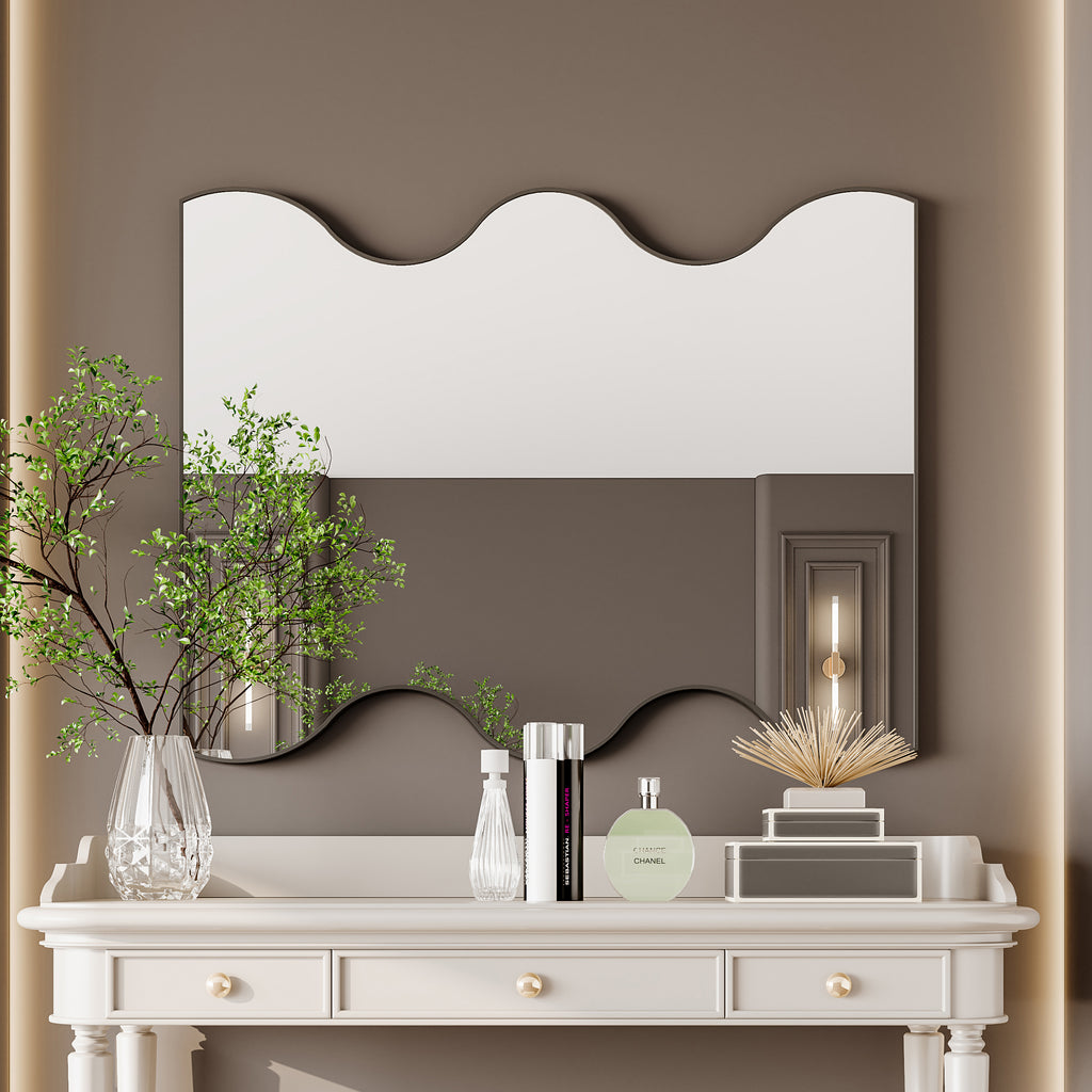 Wall mirror with wavy top and bottom edges and dark metal frame