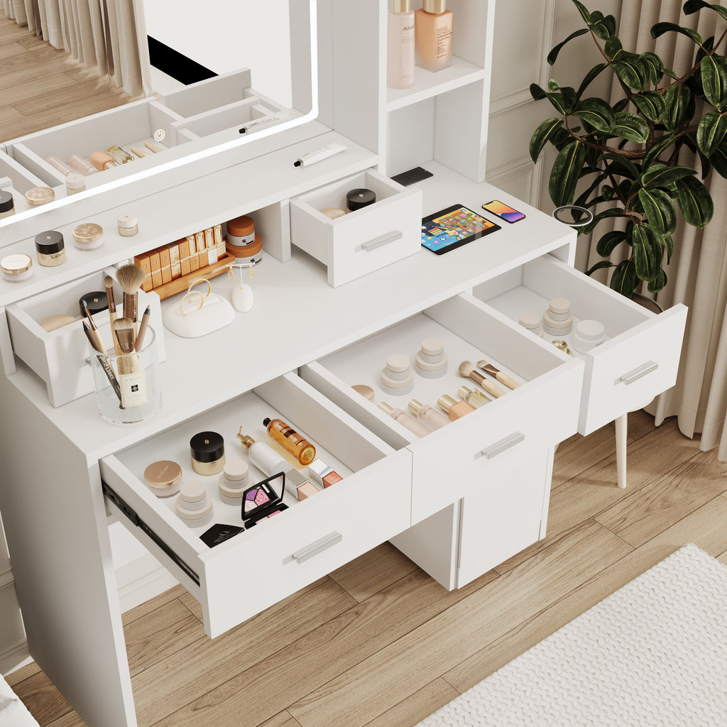 White vanity dressing table with open drawers and side compartments for cosmetics