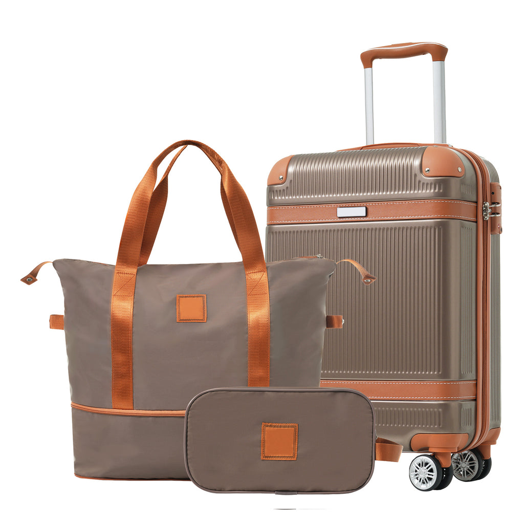 Hardshell carry-on suitcase with copper top handle, matching duffle bag, and front pouch