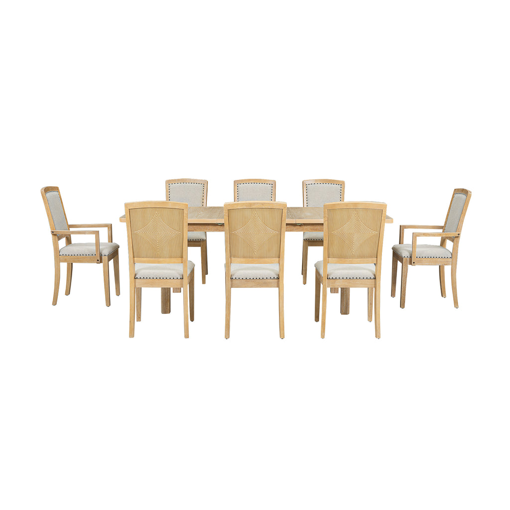 Natural wood dining table set with eight upholstered chairs in light beige fabric