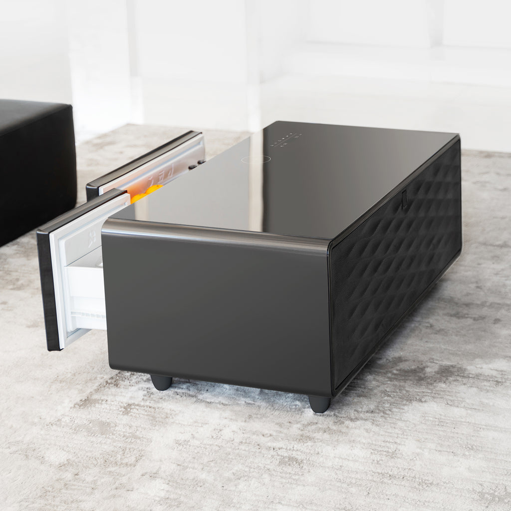 Black smart coffee table with open storage drawers and textured side panel