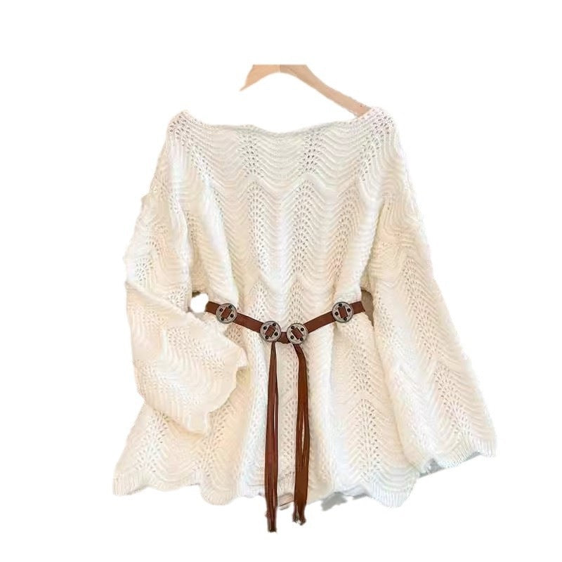 Women’s white one-shoulder knit sweater with textured pattern and tassel tie detail