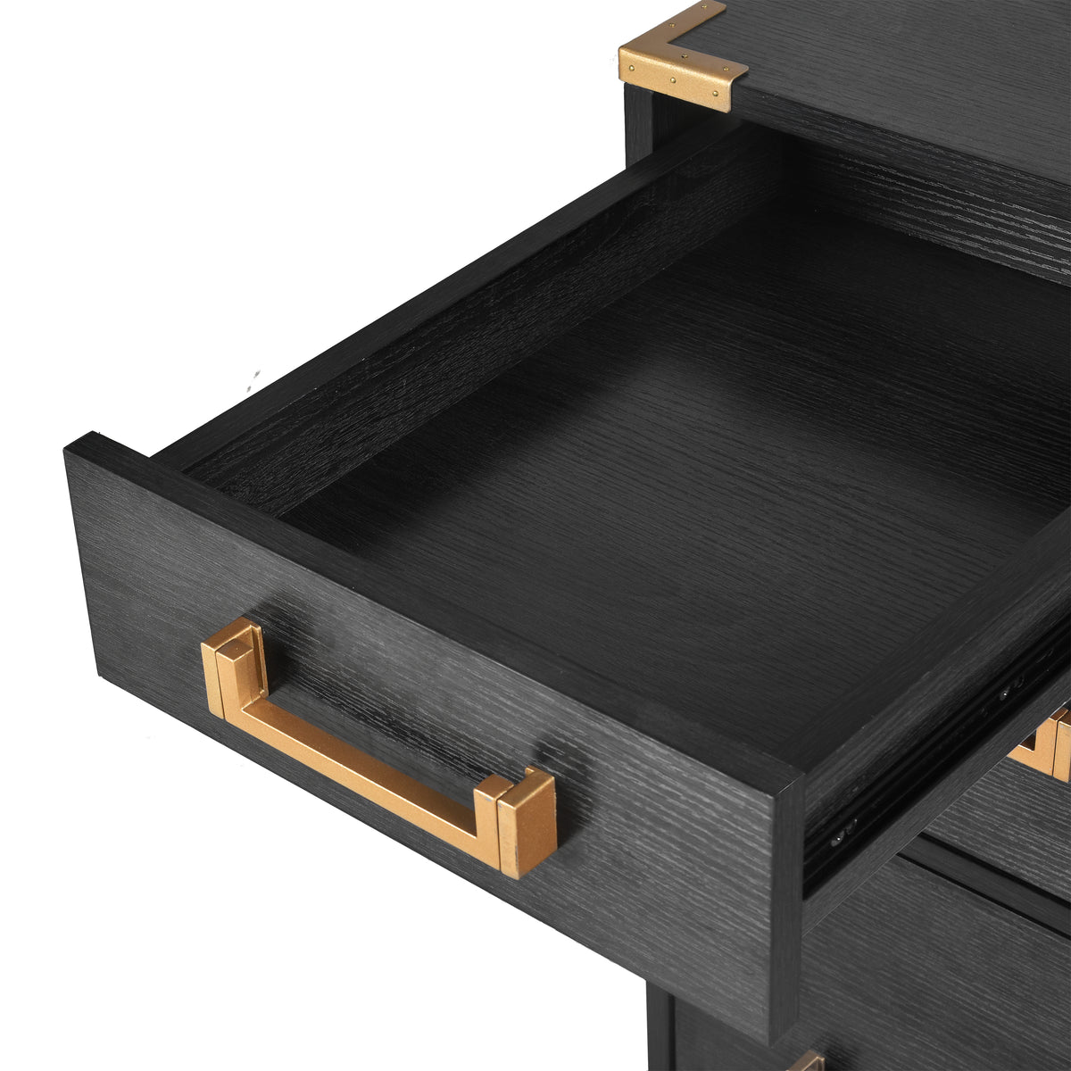 Black drawer interior with gold pull handle and smooth dark lining