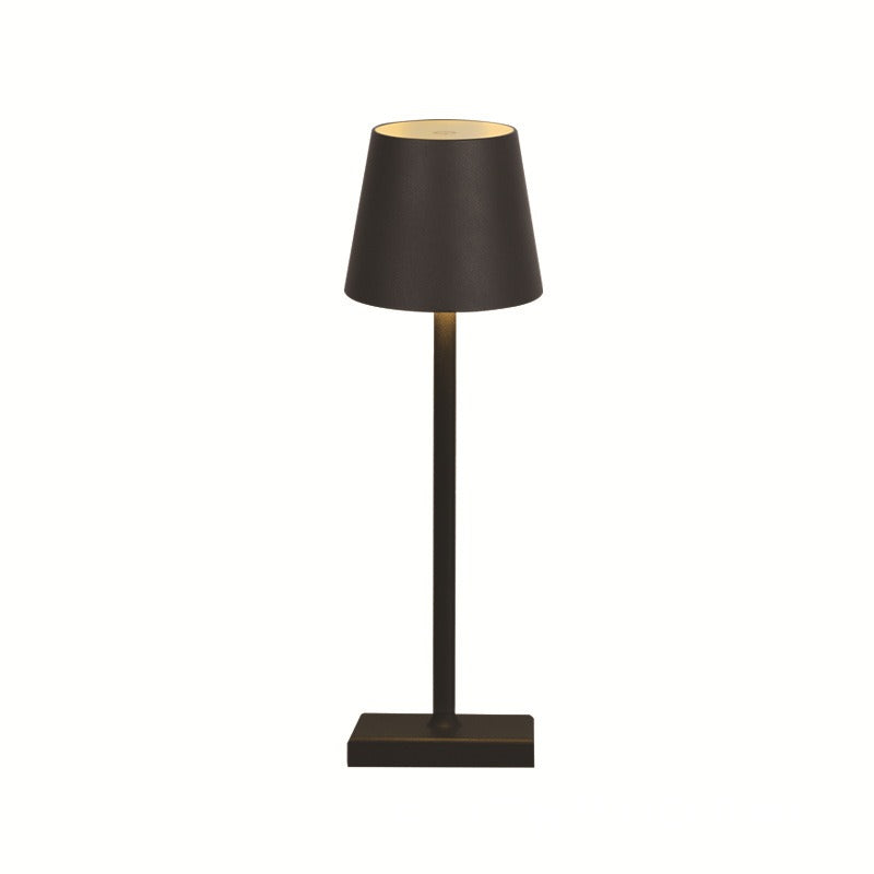Dark retro table lamp with black drum fabric shade and gold metal stand