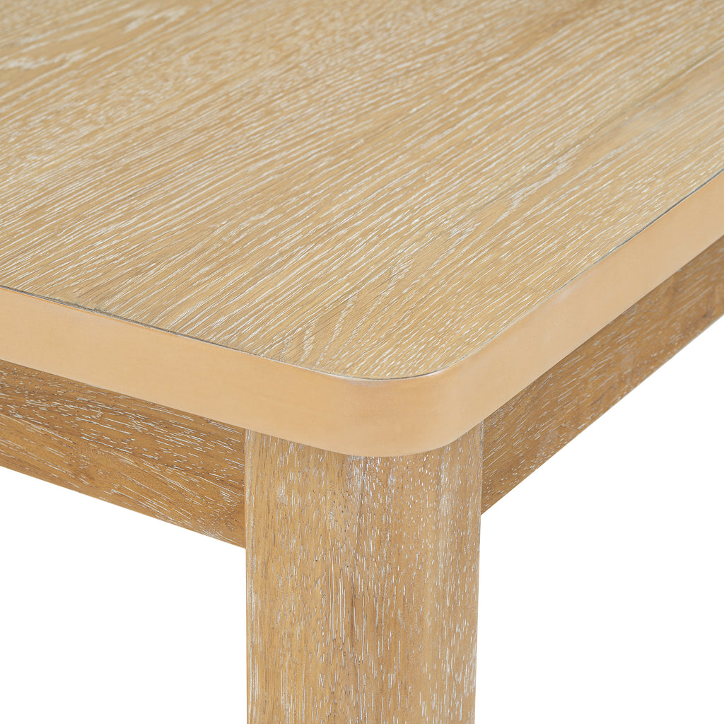 Dining table corner with natural wood grain and rounded edge, expandable-style design