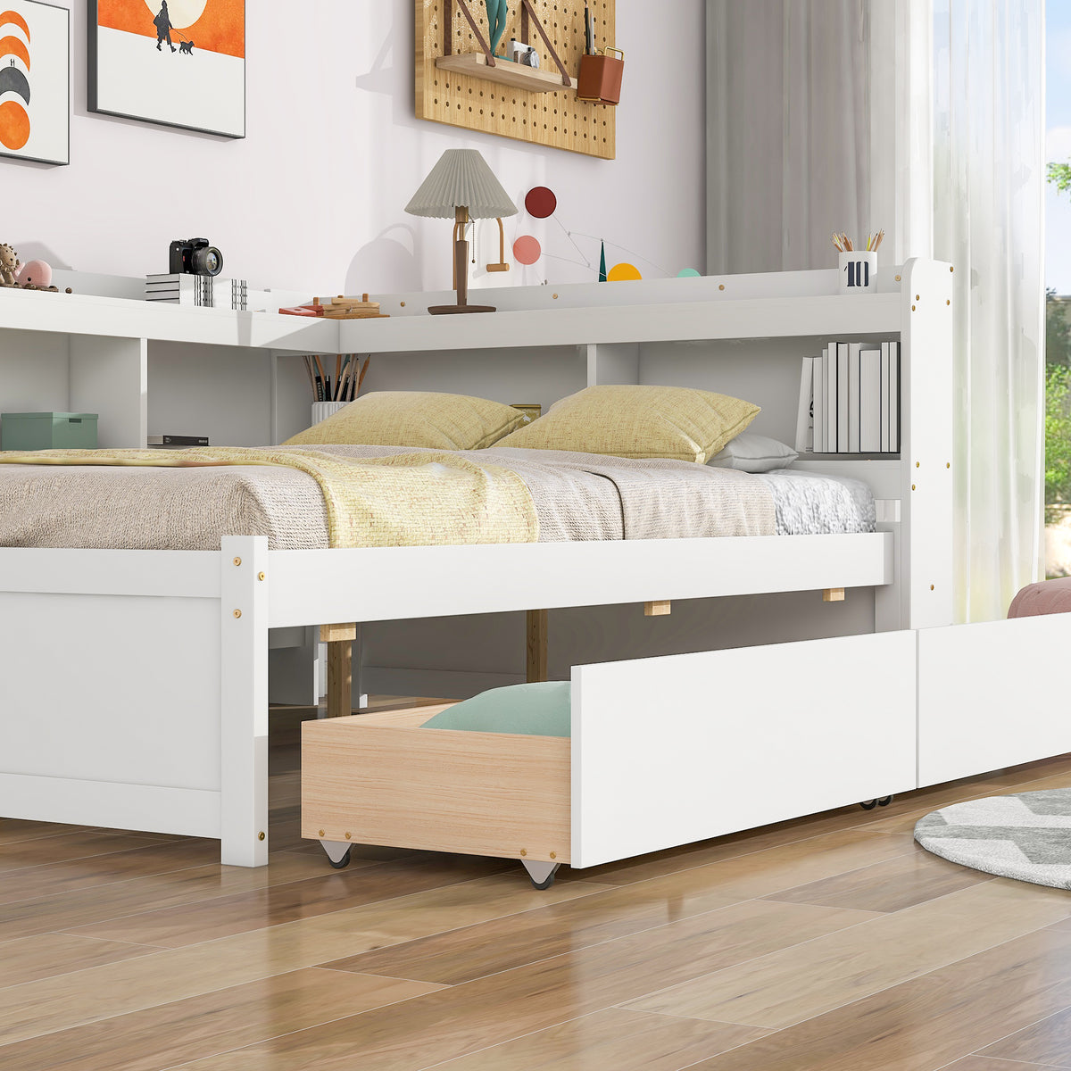White bed with L-shaped bookcase shelf, front pull-out drawers, and slatted base