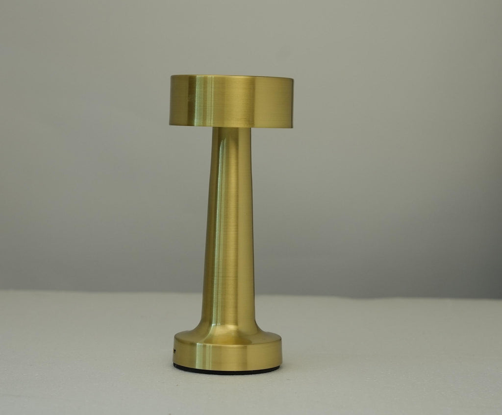 Gold retro table lamp with drum fabric shade and cylindrical metal base