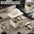White lift-top coffee table with open hidden storage and two drawers on base