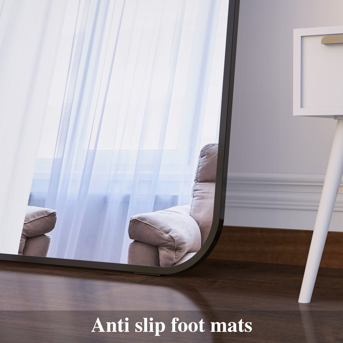 Arched floor mirror showing lower corner and dark anti-slip base