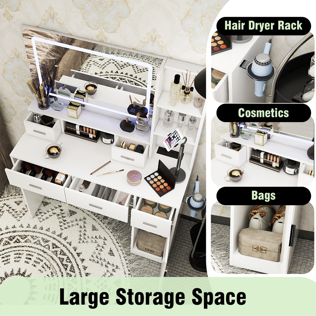 White vanity dressing table with multiple open drawers and organizer compartments