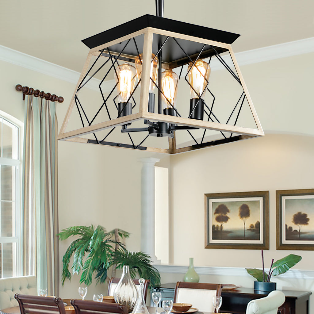 Black 4-light farmhouse chandelier with open wire cage and warm Edison bulbs lit.