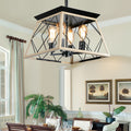 Black 4-light farmhouse chandelier with open wire cage and warm Edison bulbs lit.