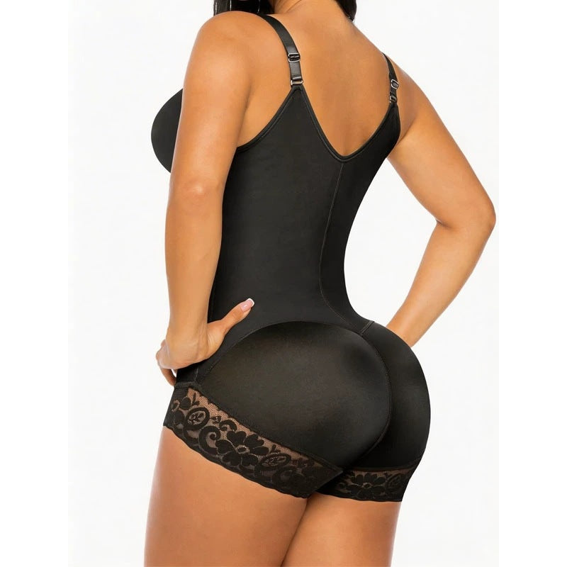Black mesh shapewear one-piece with rear straps and lace yoke at lower back