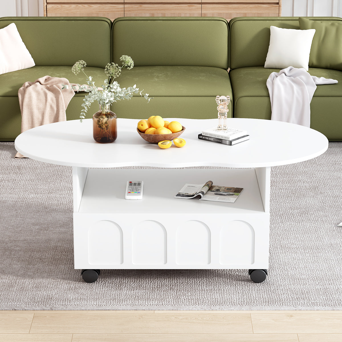 White oval coffee table with open shelf and arched front panel drawer, on casters