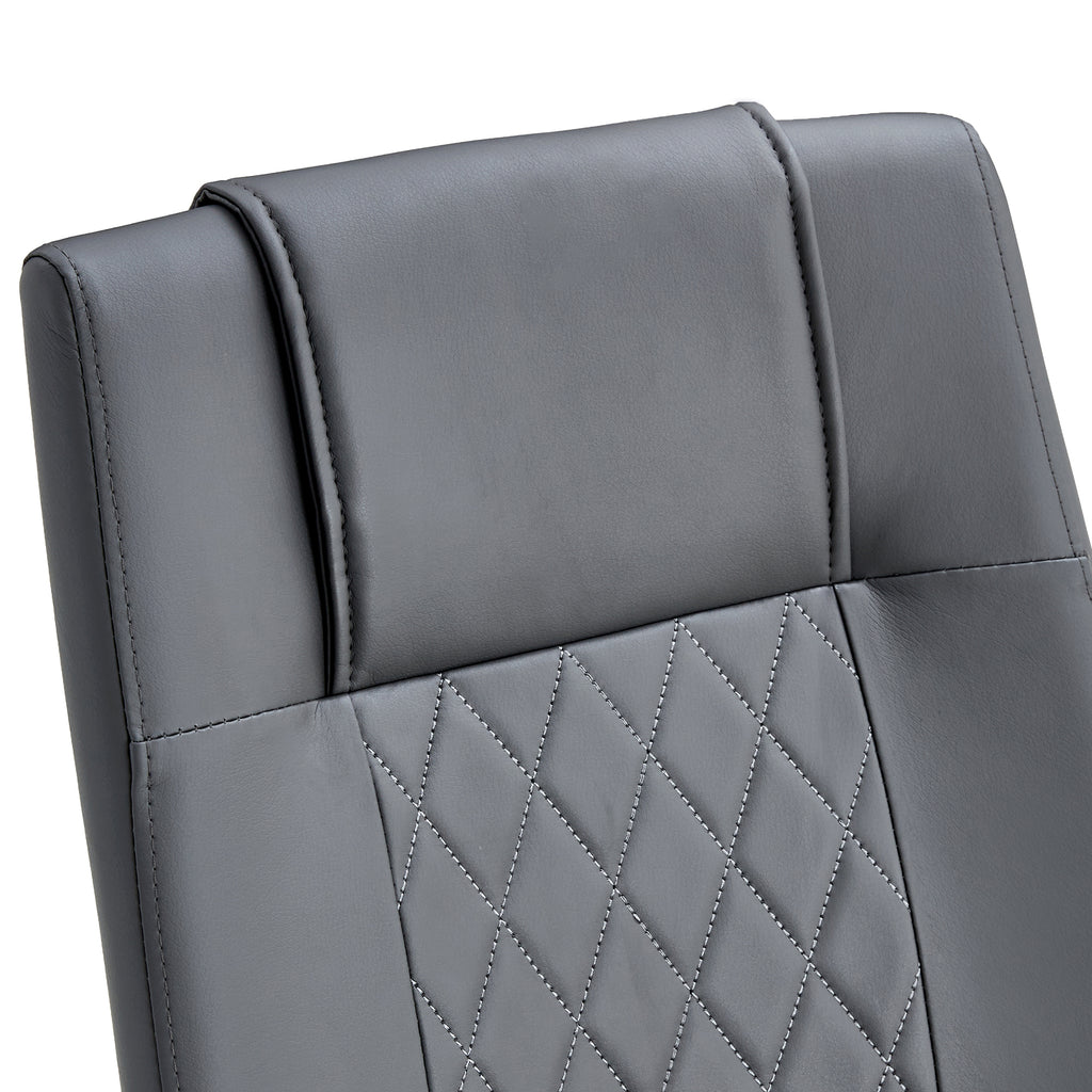 Gray chair back with quilted diamond stitching and padded headrest