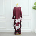 Wine red printed dress with large white floral print and dark striped border