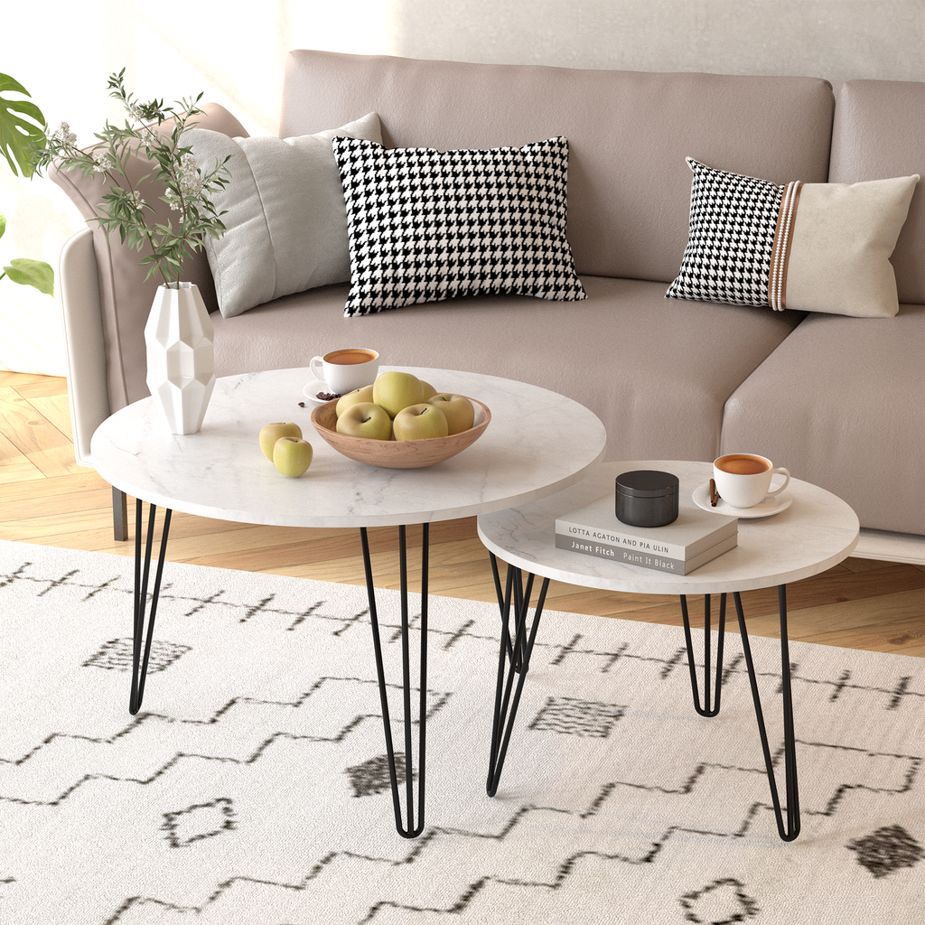 Set of 2 round nesting coffee tables with white tops and black metal legs