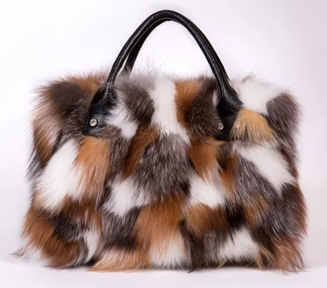 Multicolored faux fur handbag with black leather handles and small front snap