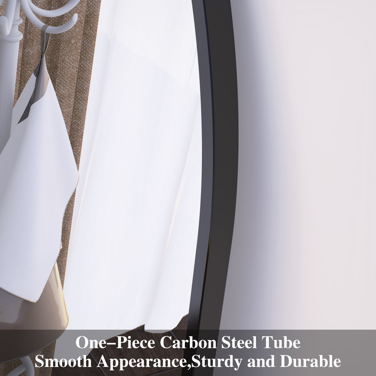 Arched mirror edge detail with black frame tube construction.