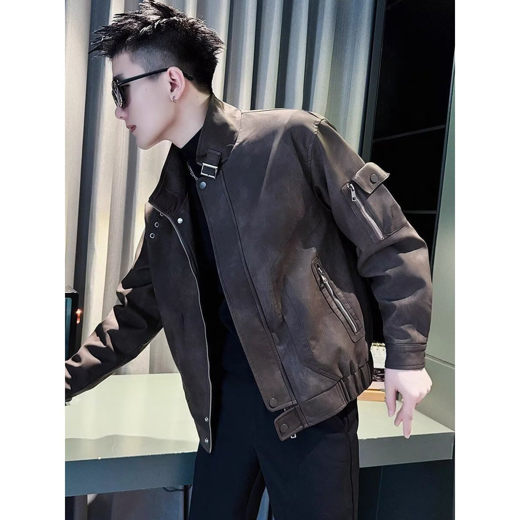 Men's dark leather stand-collar jacket with front zipper and chest pockets, side view
