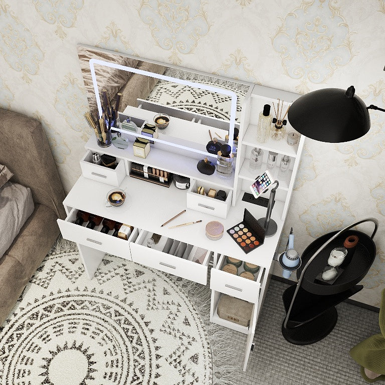 White dressing table with open storage drawers and organizer compartments on top