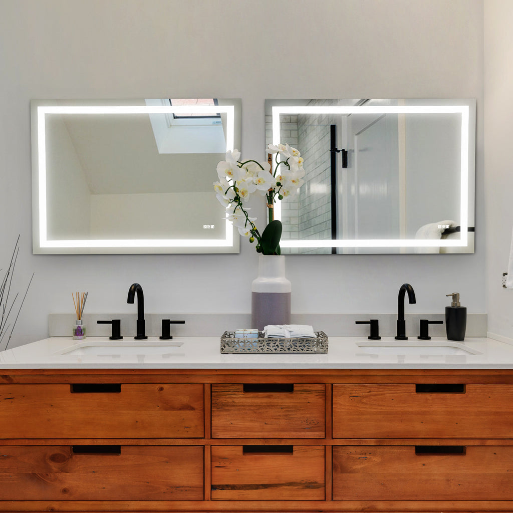LED bathroom vanity mirrors with illuminated borders over double sinks