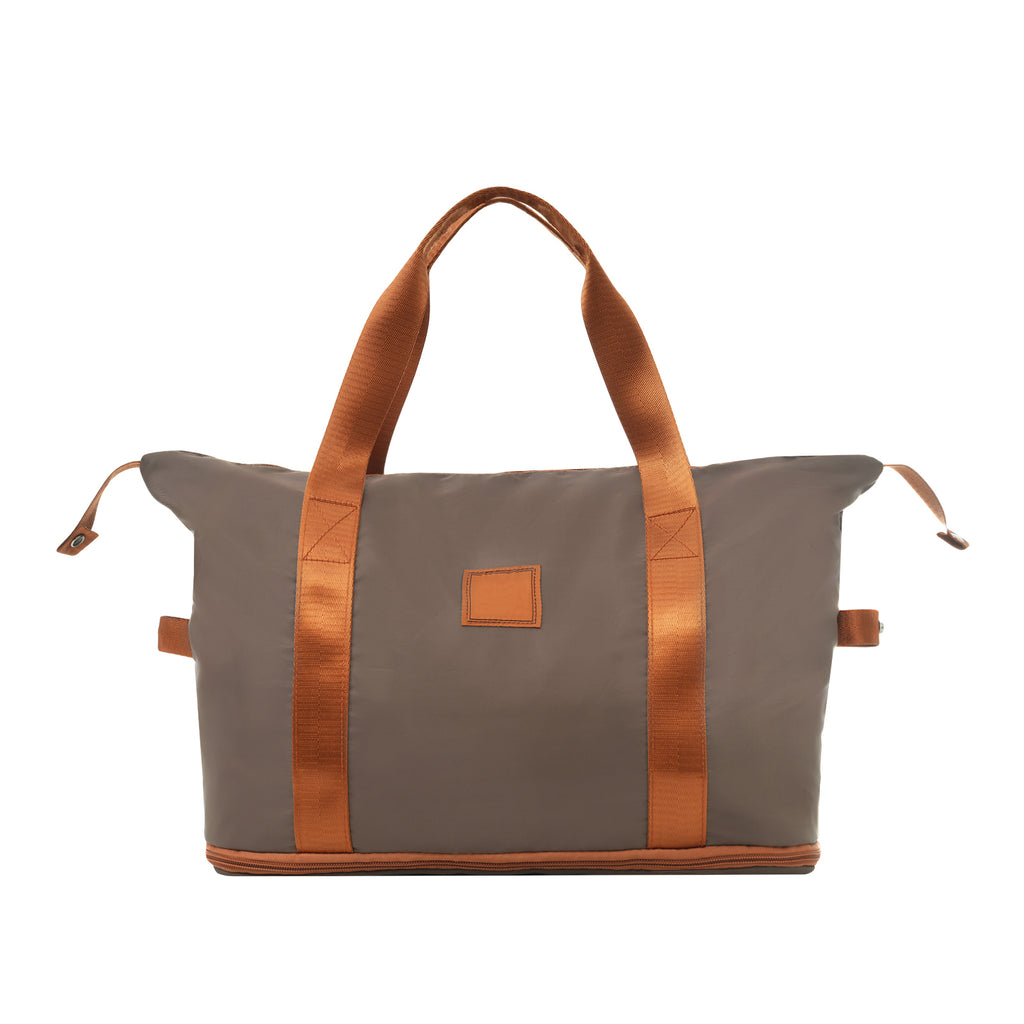 Gray-and-brown travel duffel bag with wide handles and small front patch pocket