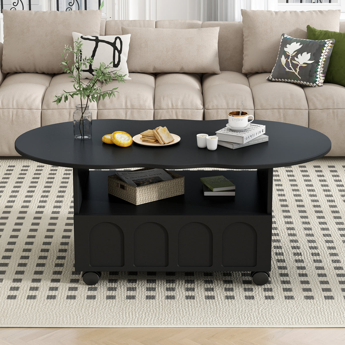 Black coffee table with round top, open middle shelf, and front drawer doors