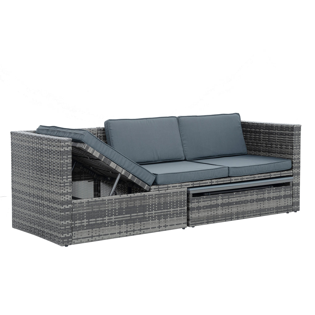 Dark gray outdoor wicker daybed style sofa with hinged back cushion