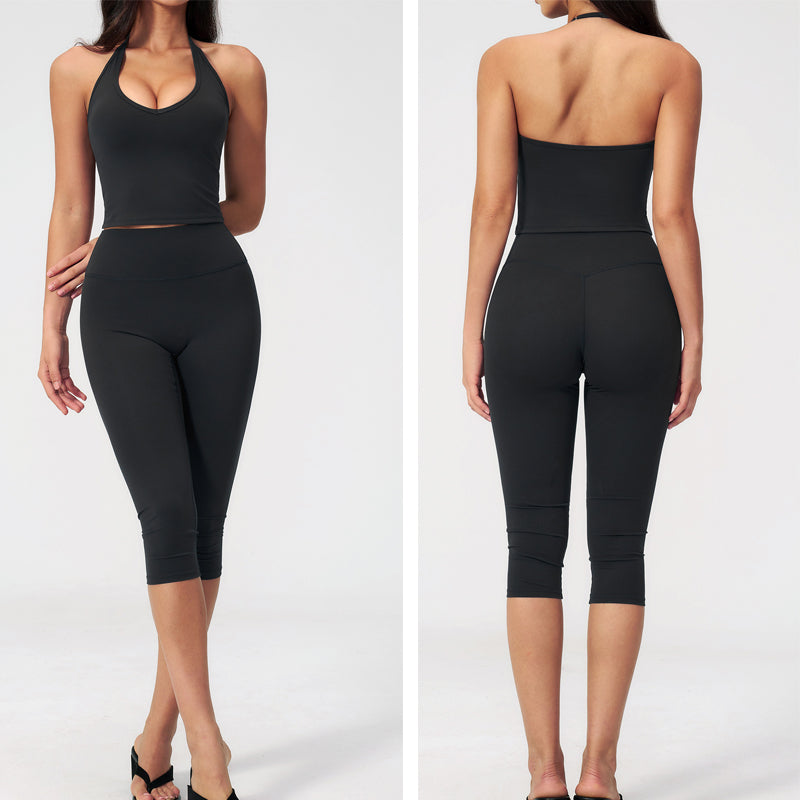 Women's black racerback sports vest and capri leggings set with contrast trim