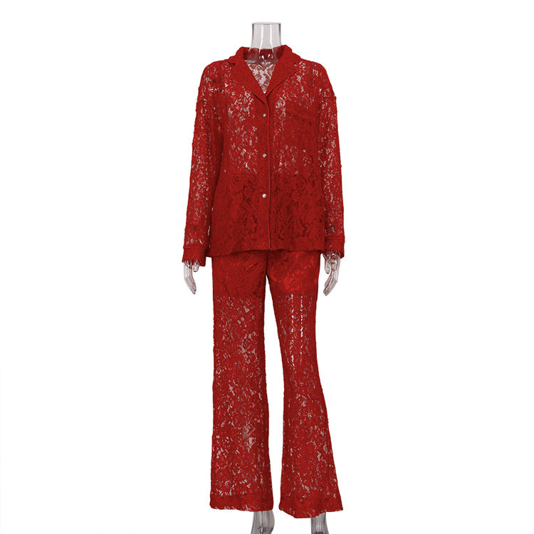 Red lace sheer two-piece shirt and wide-leg pants set on mannequin, front view.